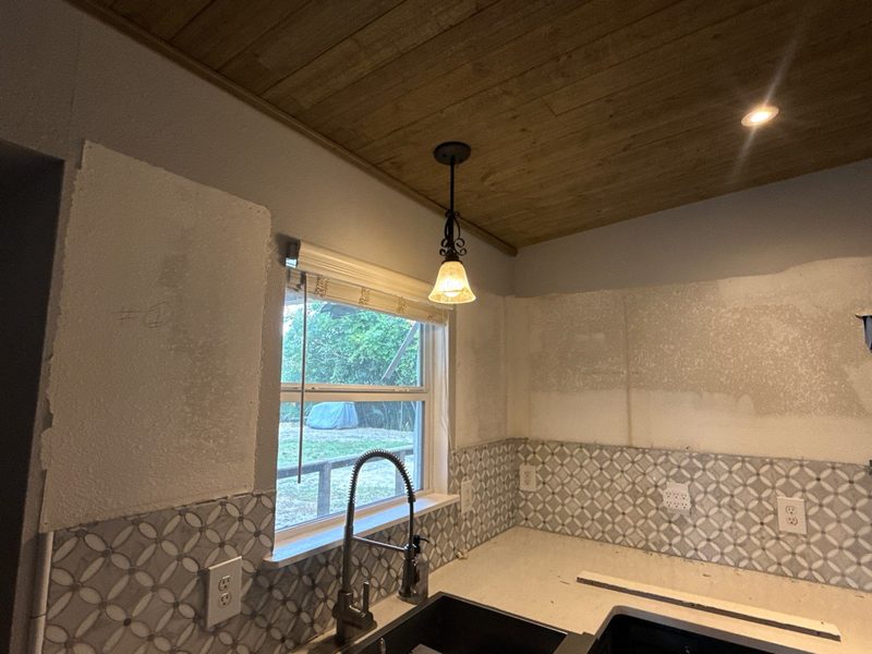 Mold-damaged drywall removed during remediation